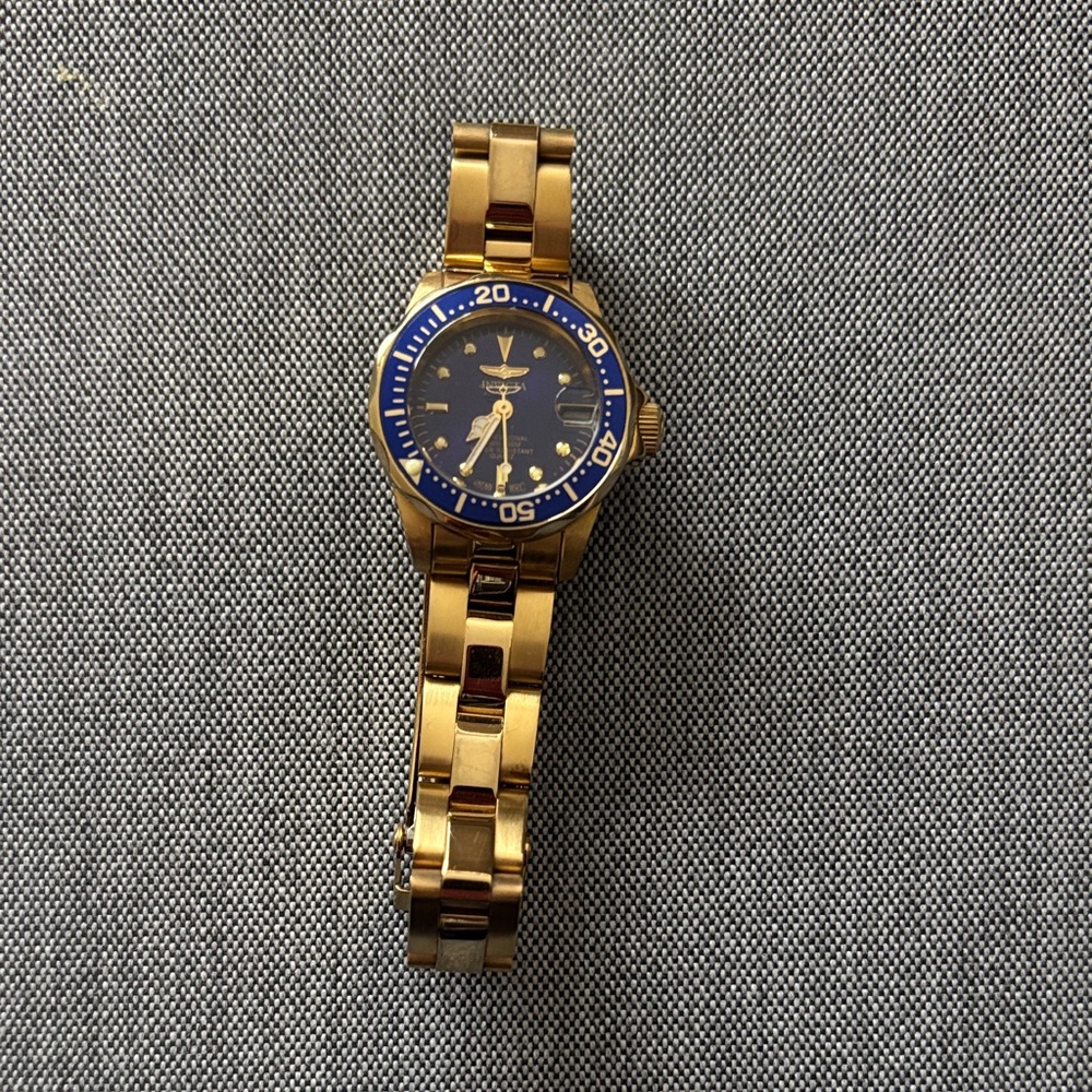 Invicta Gold Watch with blue face